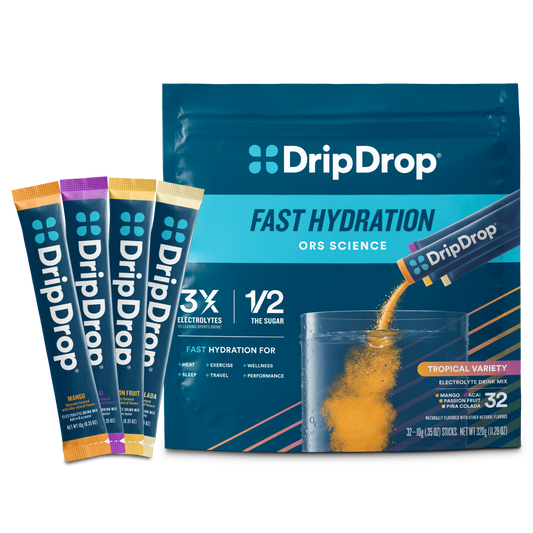 dripdrop-tropical-variety-pack-electrolyte-powder-8-oz-sticks-32-count-m0 Tropical_Variety_-_32ct_-_Transparent.png